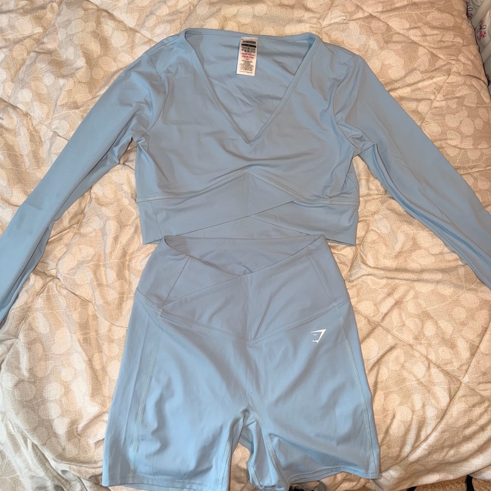 Gymshark Women's Sky Blue Bike Shorts and cropped top